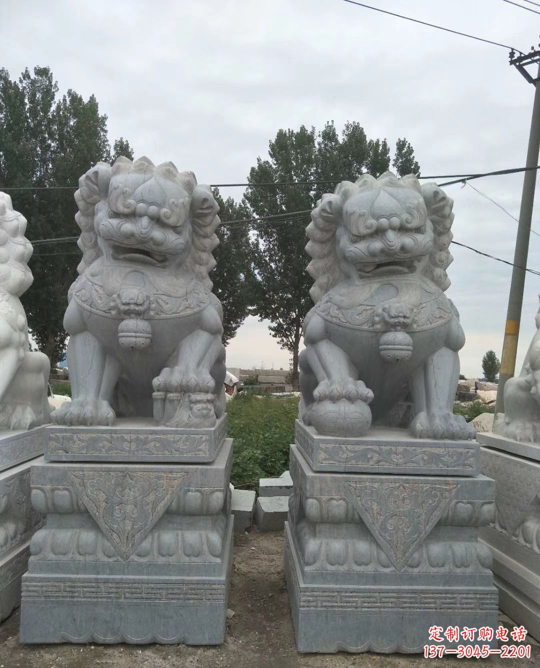 泰州青石狮子象征力量的传统精灵