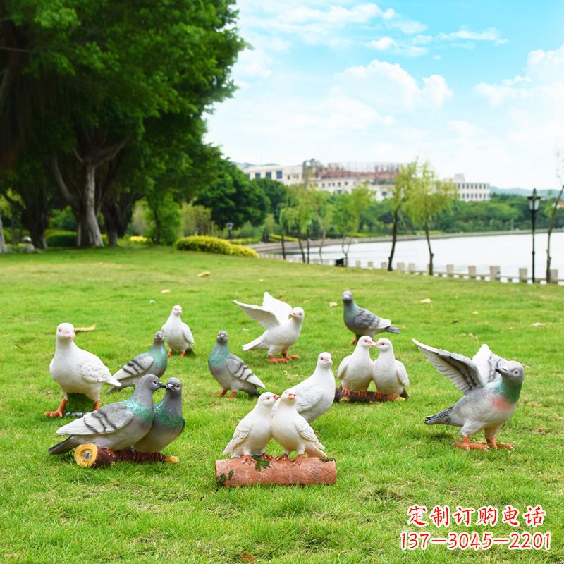 泰州大学雕塑手举和平鸽