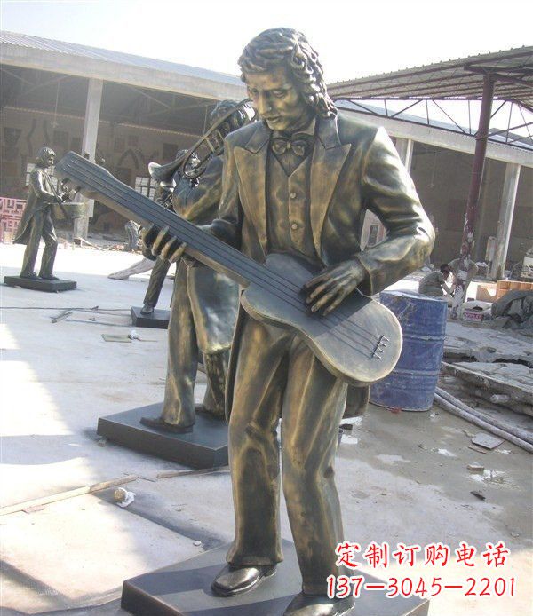 泰州西方人物铜吉他雕塑