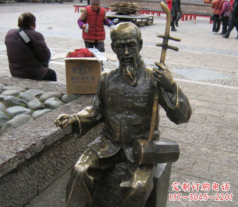 泰州公园拉二胡的老人小品铜雕