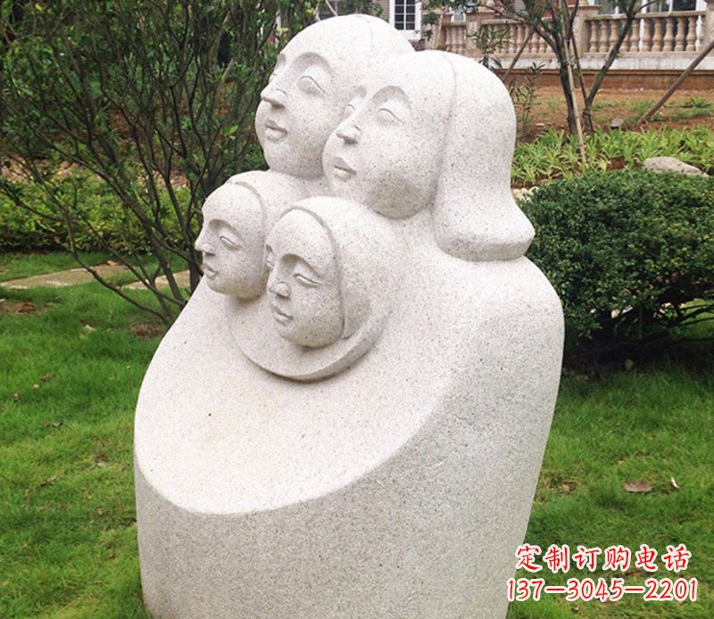 泰州公园母子人头像石雕