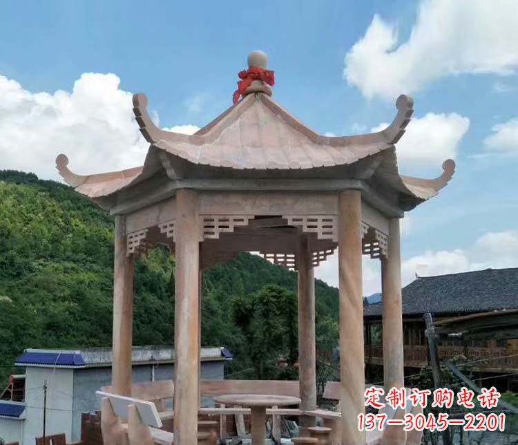 泰州一流的公园晚霞红六角石雕凉亭