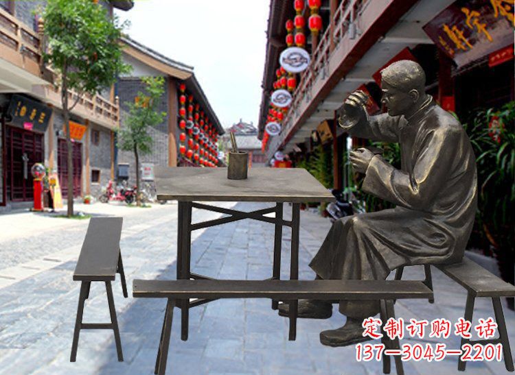 泰州享受下午茶时光的店小二喝茶雕塑
