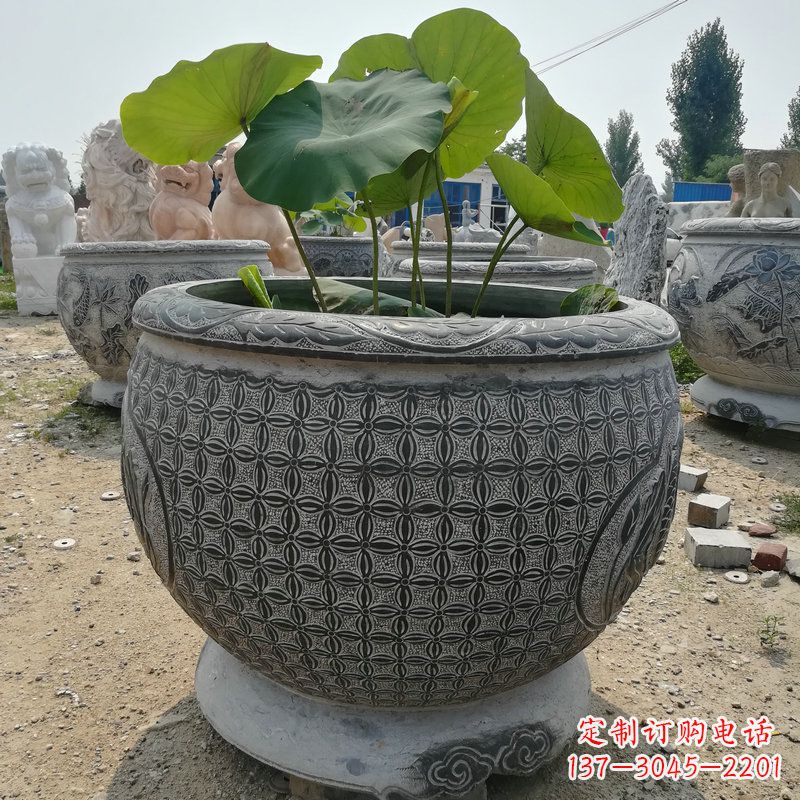 泰州荷花鱼石雕塑,精美雕塑展现浪漫情怀