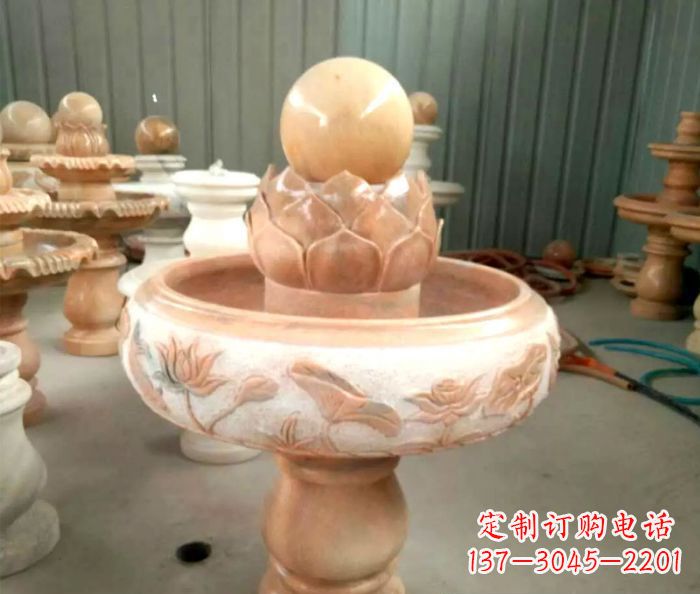 泰州石来运转晚霞红风水球喷泉石雕