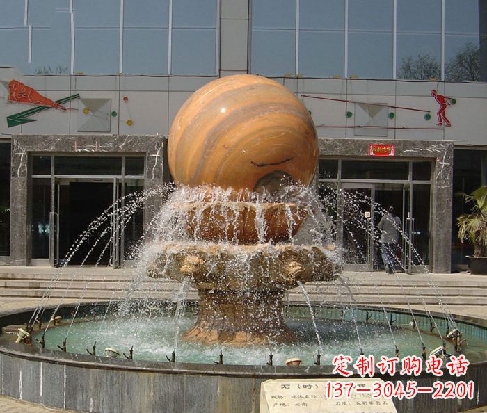 泰州石来运转球晚霞红风水球石雕