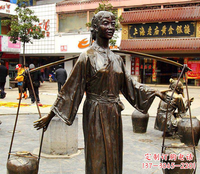 泰州挑着罐子的古代女人铜雕