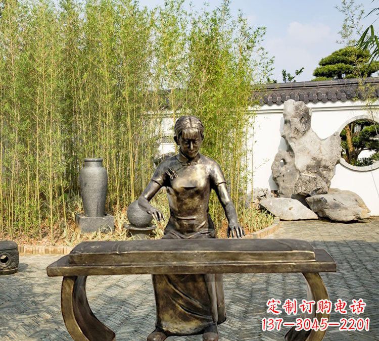 泰州铜雕弹古筝人物