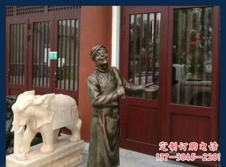 泰州铜雕店小二酒店迎宾人物雕塑