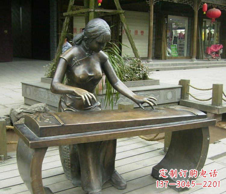 泰州铜雕现代人物弹古筝雕塑