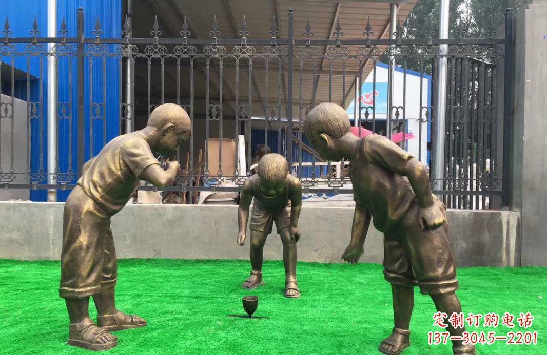 泰州玩陀螺儿童铜雕塑