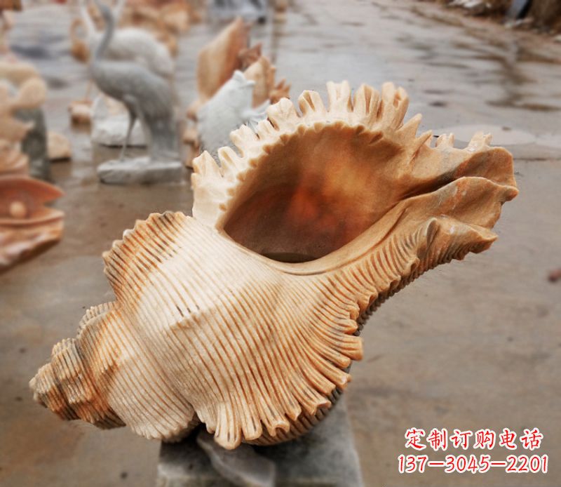 泰州晚霞红海螺石雕广场景观雕塑