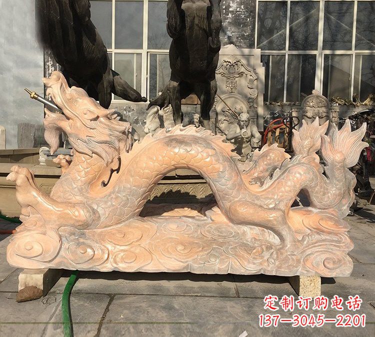 泰州晚霞红石雕喷水龙