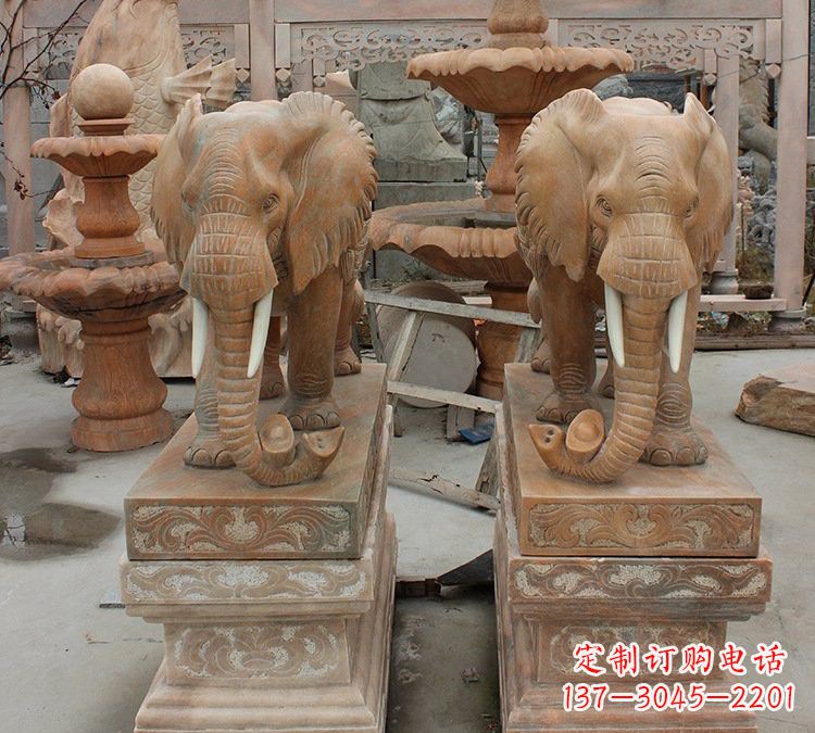 泰州晚霞红石雕元宝大象