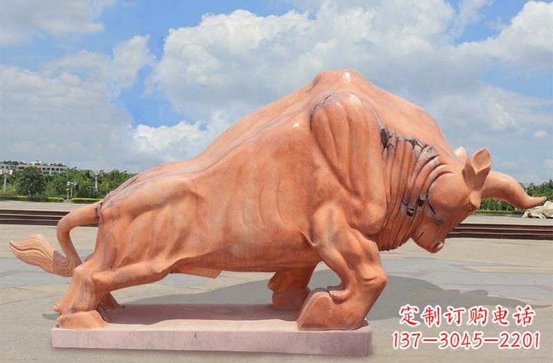 泰州晚霞红拓荒牛石雕