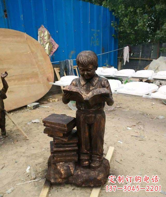 泰州小孩看书玻璃钢仿铜人物雕塑