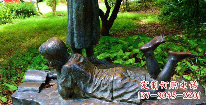 泰州校园趴着看书的小男孩人物铜雕