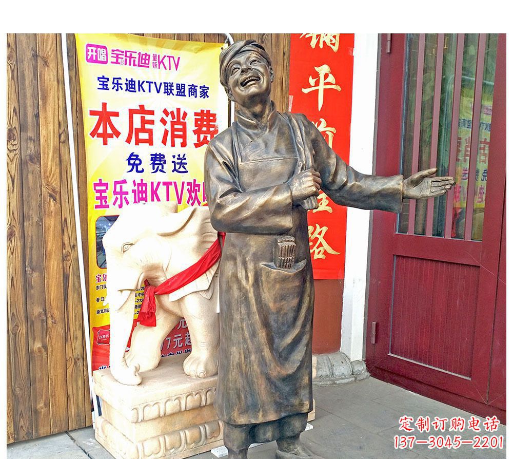 泰州迎宾的店小二铜雕