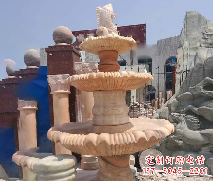 泰州园林景观晚霞红鲤鱼喷泉石雕