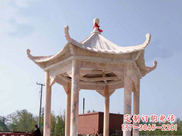 泰州园林景观晚霞红六角石雕凉亭